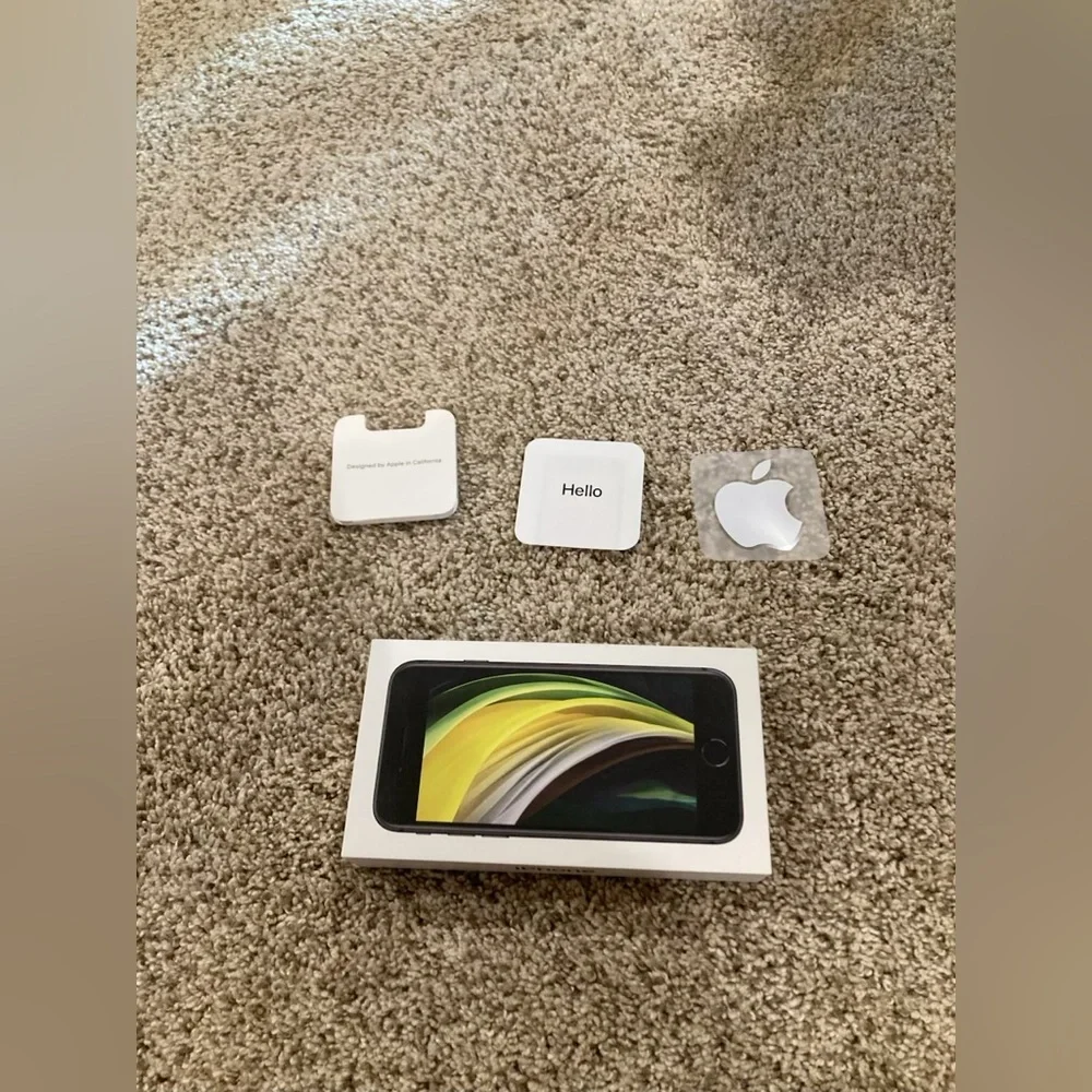 Apple iPhone SE black 64GB product box and instructions